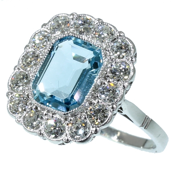 Platinum estate engagement ring with beautiful aquamarine and diamonds